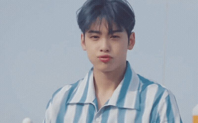 Young Man In Blue And White Striped Shirt With Bubbles GIF
