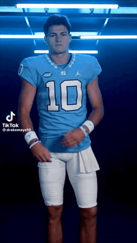 Young Man In Blue Football Jersey Number 10 GIF