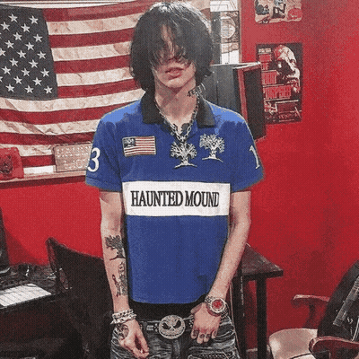 Young Man In Blue Haunted Mound Shirt GIF