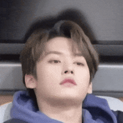 Young Man In Blue Hoodie Laying Down GIF