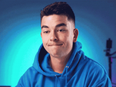 Young Man In Blue Hoodie Making Funny Face GIF