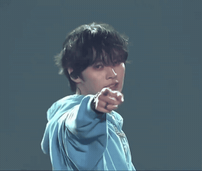 Young Man In Blue Hoodie Pointing Finger GIF