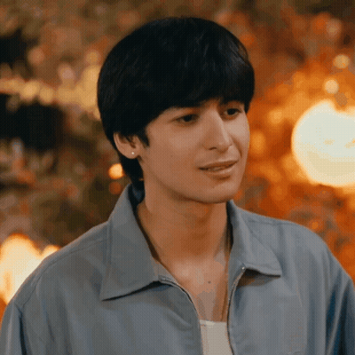Young Man In Blue Jacket And Earrings GIF