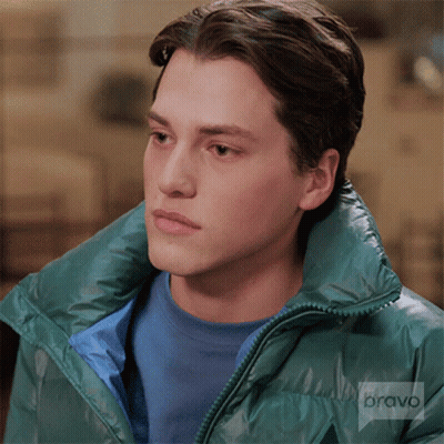 Young Man In Blue Shirt And Green Jacket With Bravo GIF