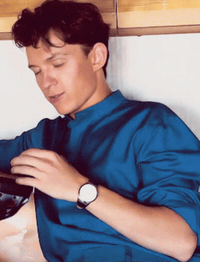 Young Man In Blue Shirt And Watch GIF