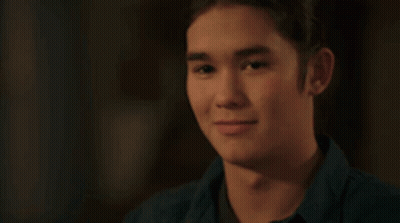 Young Man In Blue Shirt Smiling GIF