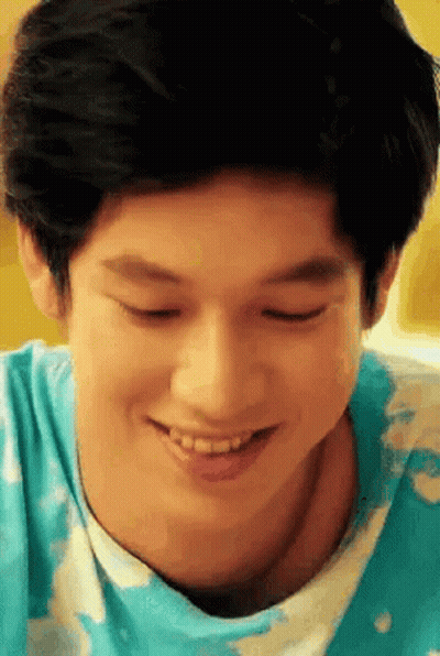 Young Man In Blue Shirt Smiling Eyes Closed GIF