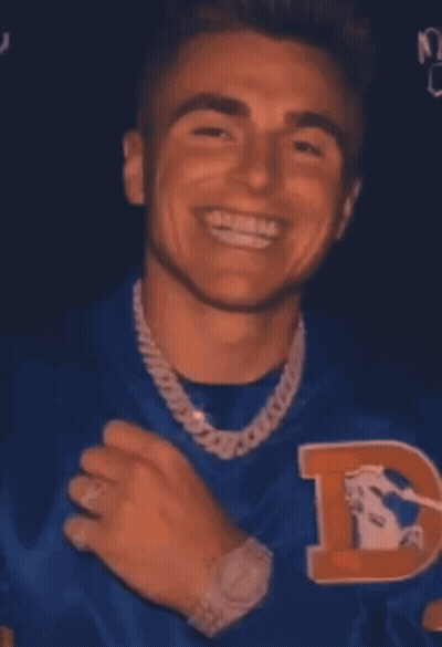 Young Man In Blue Shirt With Letter B GIF