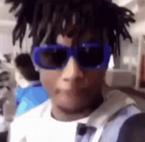 Young Man In Blue Sunglasses Taking Selfie GIF