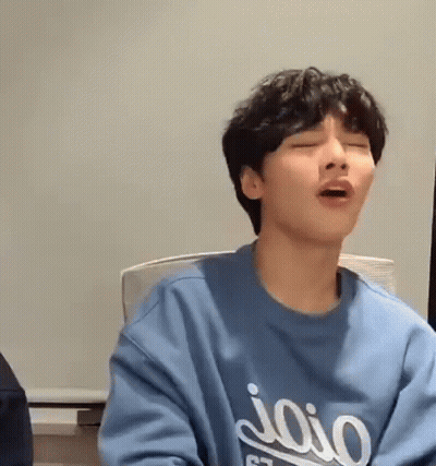 Young Man In Blue Sweatshirt With Mouth Open GIF