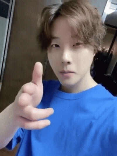 Young Man In Blue T-Shirt Giving Thumbs Up GIF