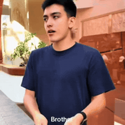 Young Man In Blue T-Shirt Saying Brother GIF