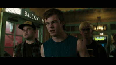 Young Man In Blue Tank Top Making Funny Face GIF