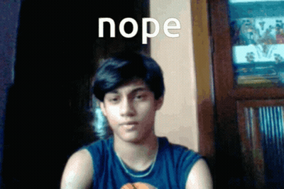 Young Man In Blue Tank Top Says Nope GIF