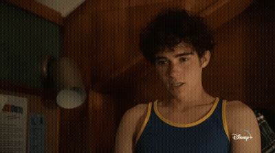 Young Man In Blue Tank Top With Disney Plus GIF