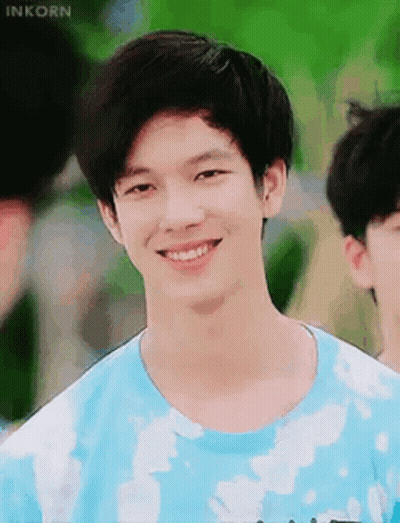Young Man In Blue Tie-Dye T-Shirt Smiling GIF