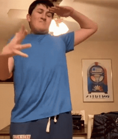 Young Man In Blue U.S. Army Shirt GIF