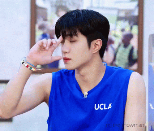 Young Man In Blue UCLA Shirt GIF