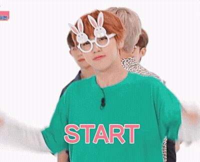 Young Man In Bunny Glasses And Green Shirt Saying Start GIF