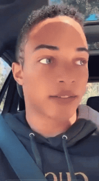 Young Man In Car Wearing Black Hoodie Saying Chic GIF