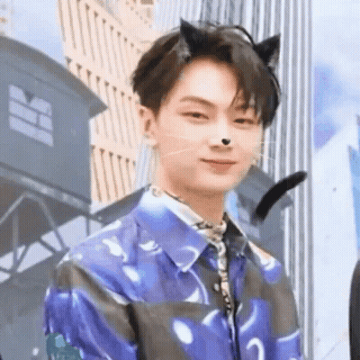 Young Man In Cat Ears And Blue Shirt GIF