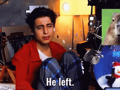 Young Man In Chair Saying He Left Eyes Closed GIF