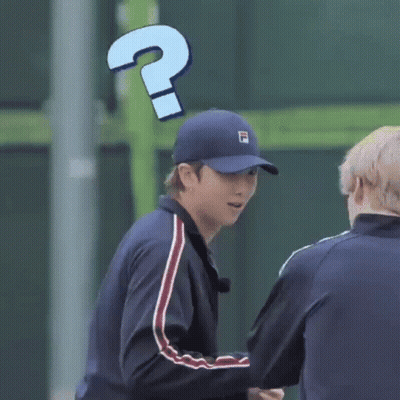 Young Man In Denim Jacket And Baseball Cap Making Funny Face GIF