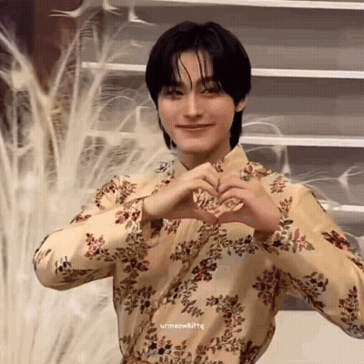Young Man In Floral Shirt Making Heart With Hands GIF