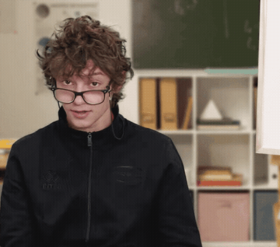 Young Man In Glasses And Black Jacket With TNF GIF