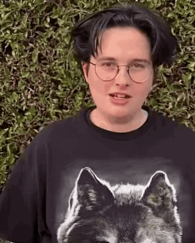 Young Man In Glasses And Black Wolf T-Shirt GIF
