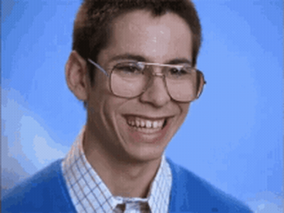 Young Man In Glasses And Blue Shirt Smiling GIF