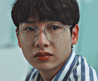 Young Man In Glasses And Striped Shirt GIF