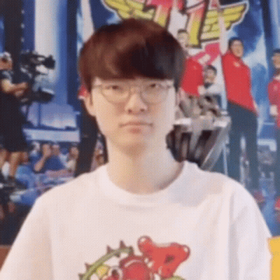 Young Man In Glasses And White T-Shirt GIF