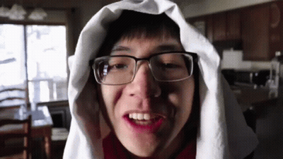 Young Man In Glasses And White Towel Smiling GIF