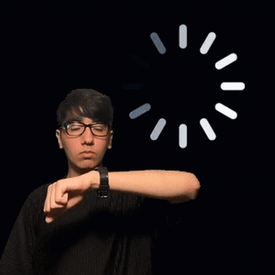 Young Man In Glasses Checking Watch GIF
