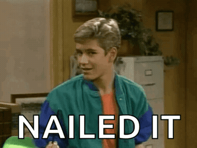 Young Man in Green and Blue Jacket Saying Nailed It