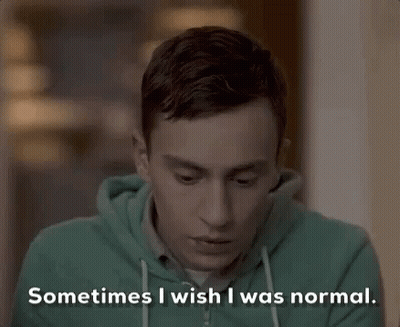 Young Man In Green Hoodie Wishes He Was Normal GIF