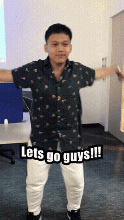 Young Man In Green Shirt Dancing Says Let's Go Guys GIF