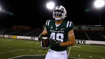 Young Man In Green Shirt With Bu-Usc Auditor GIF
