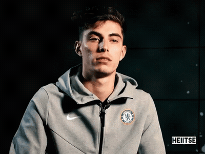 Young Man In Grey Nike Jacket With Chelsea Logo GIF