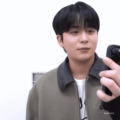 Young Man In Grey Sleeveless Shirt Making Heart GIF