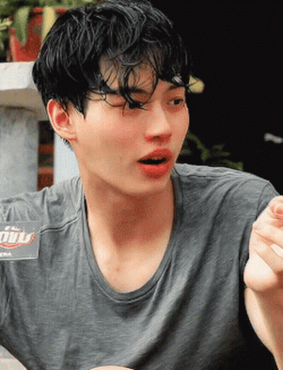 Young Man In Grey T-Shirt With Gulf Logo GIF