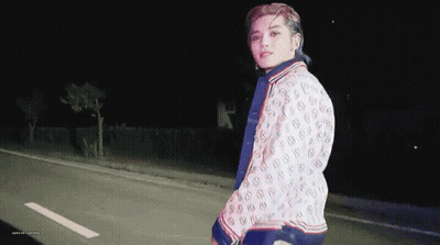 Young Man In Gucci Jacket Walking At Night GIF