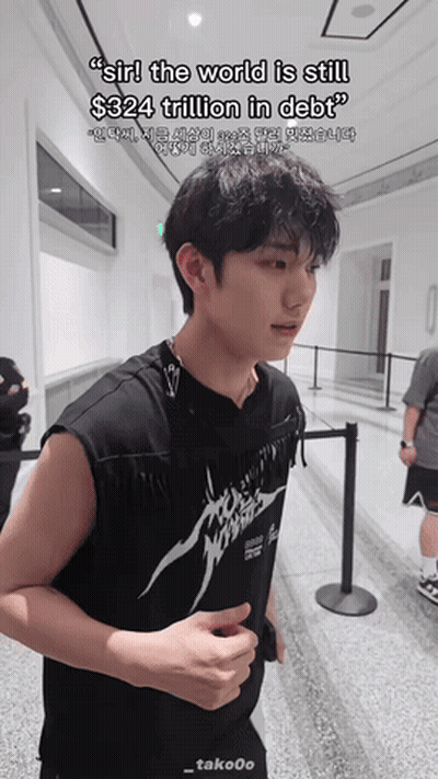 Young Man In Hallway Saying Sir The World Is Still $324 Trillion In Debt GIF