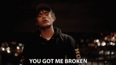 Young Man In Hat And Hoodie Saying You Got Me Broken GIF