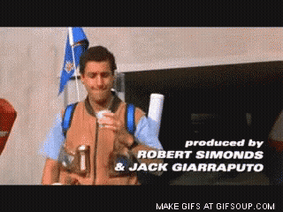 Young Man In Hat And White Sweater GIF