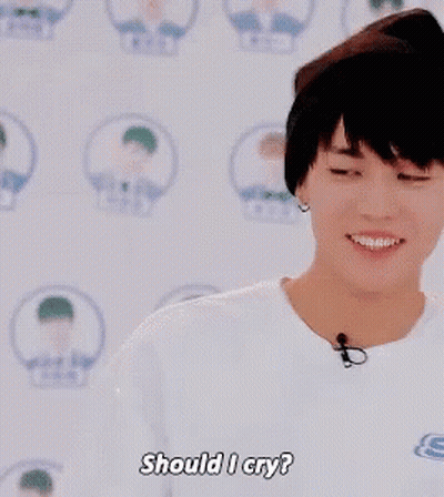 Young Man In Hat Talking Into Microphone GIF