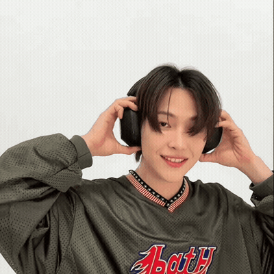 Young Man In Headphones And Abarth Jersey GIF