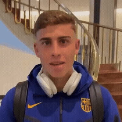 Young Man In Headphones And FC Barcelona Jacket GIF