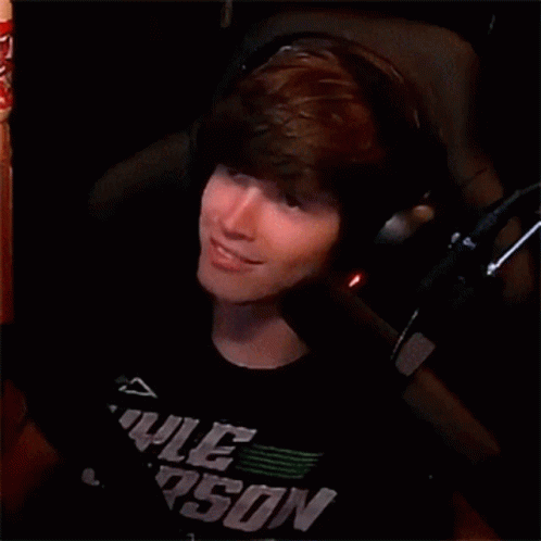 Young Man In Headphones And Kyle Arson Shirt GIF